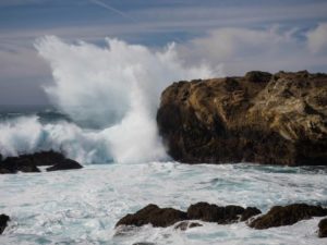 Wave crashing on rock