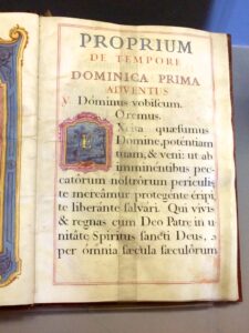Illuminated manuscript in Latin, which translated reads "Stir up your power, O God, and with great might come among us."